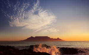 image of Table Mountain and breaking waves and clouds